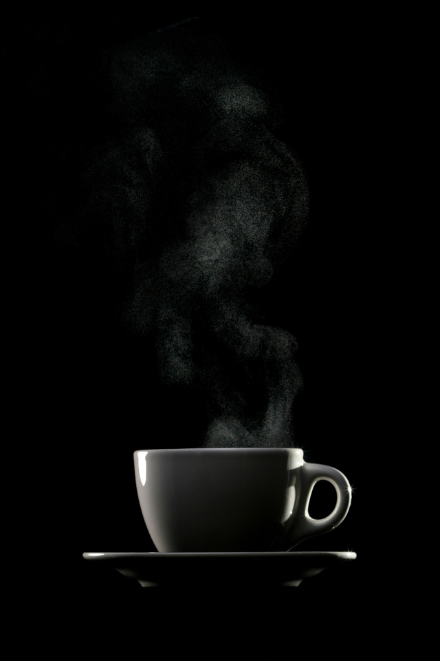Steaming coffee Steaming Coffee Black Background